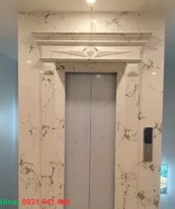 đá ốp mặt tiền thang máy